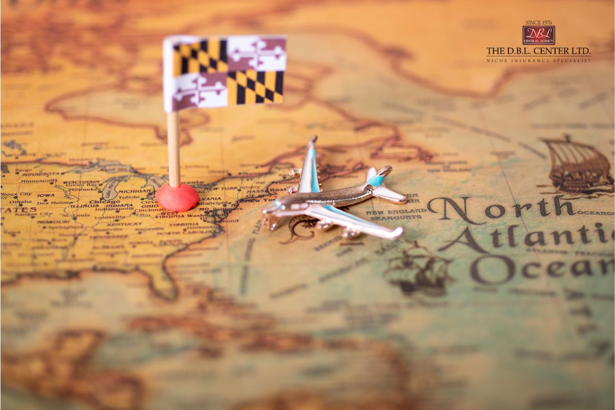 Maryland Map with airplane landing Map of US with toy plane landing next to a Maryland state flag.
